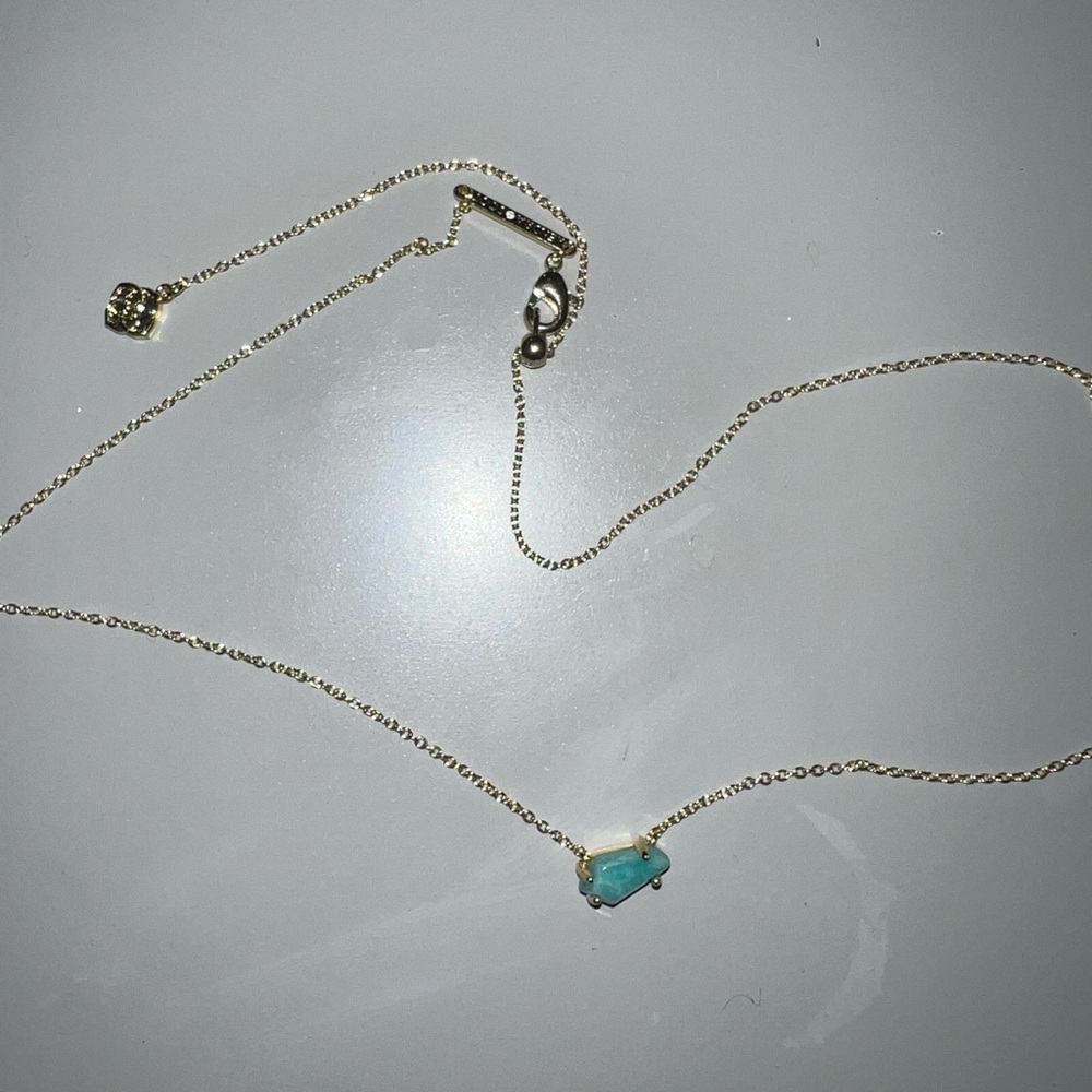 Elegant Gold Necklace with Turquoise Pendant
